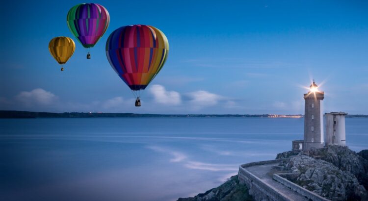 Hot Air Balloons by a lighthouse